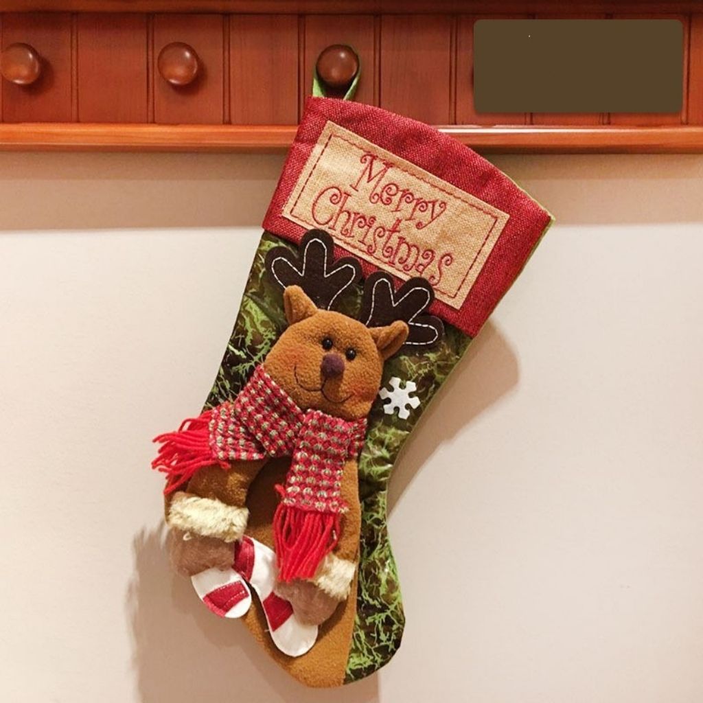 Festive holiday stocking featuring soft reindeer character and fabric construction