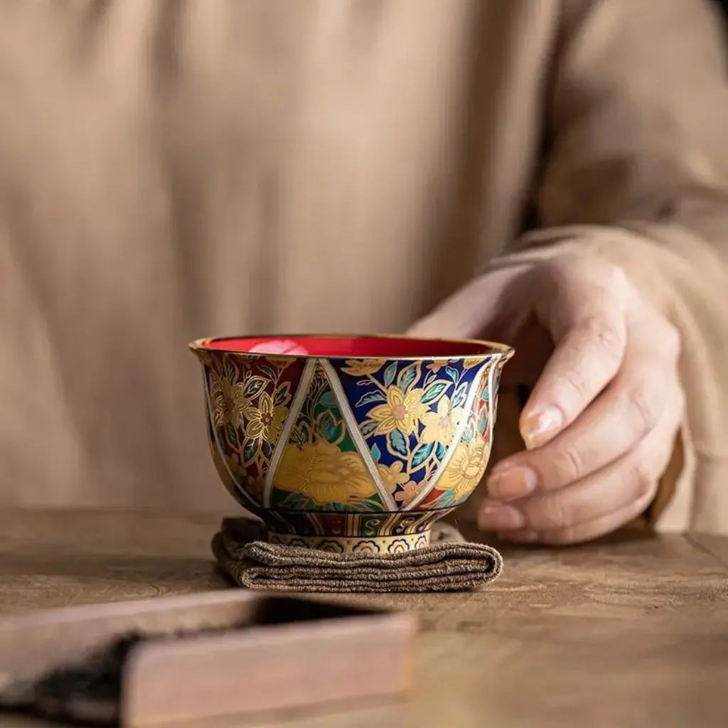 Authentic Japanese ceramic enamel cup with traditional design for elegant tea serving experiences