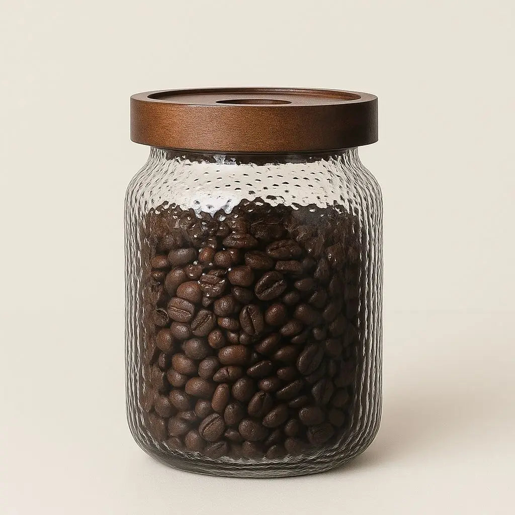 Sustainable glass storage jar featuring natural acacia wood construction for eco-conscious kitchen organization.