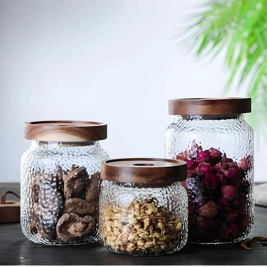 Clear glass food storage jar with acacia lid offering secure kitchen organization and pantry solutions.