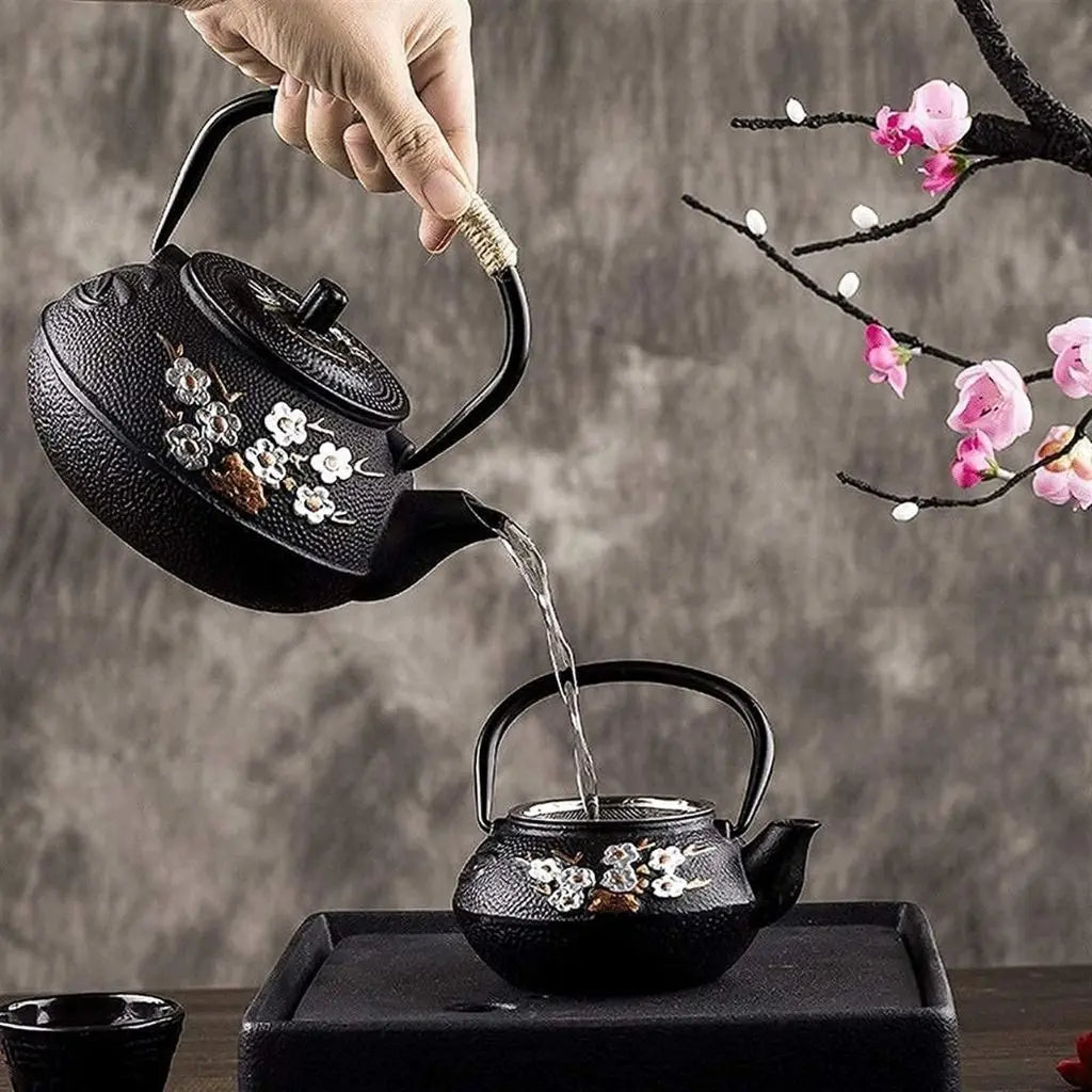 Cast iron teapot with ergonomic rope-wrapped handle designed for secure and comfortable tea service