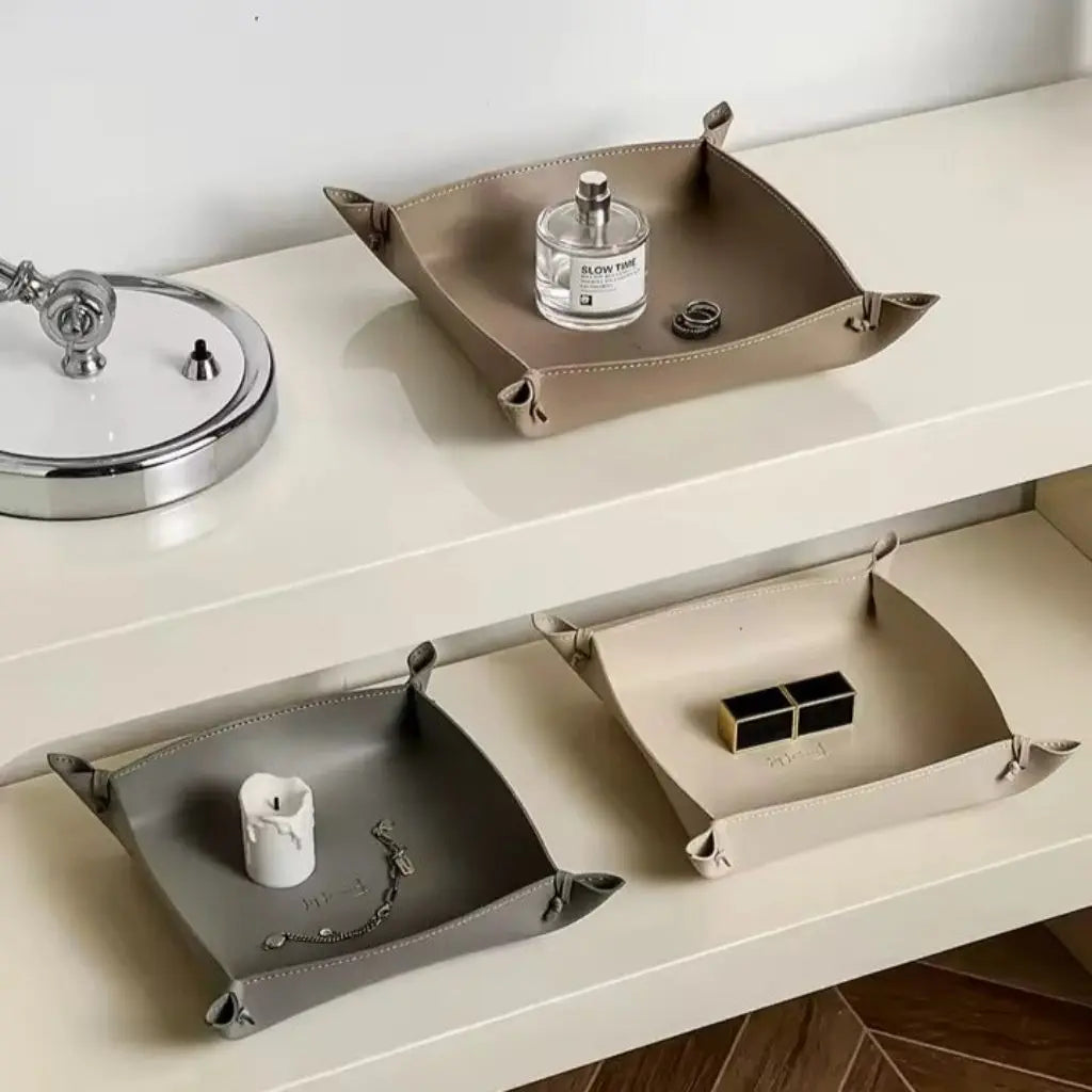 Compact faux leather organizer tray showing dual size options for desktop and dresser storage solutions
