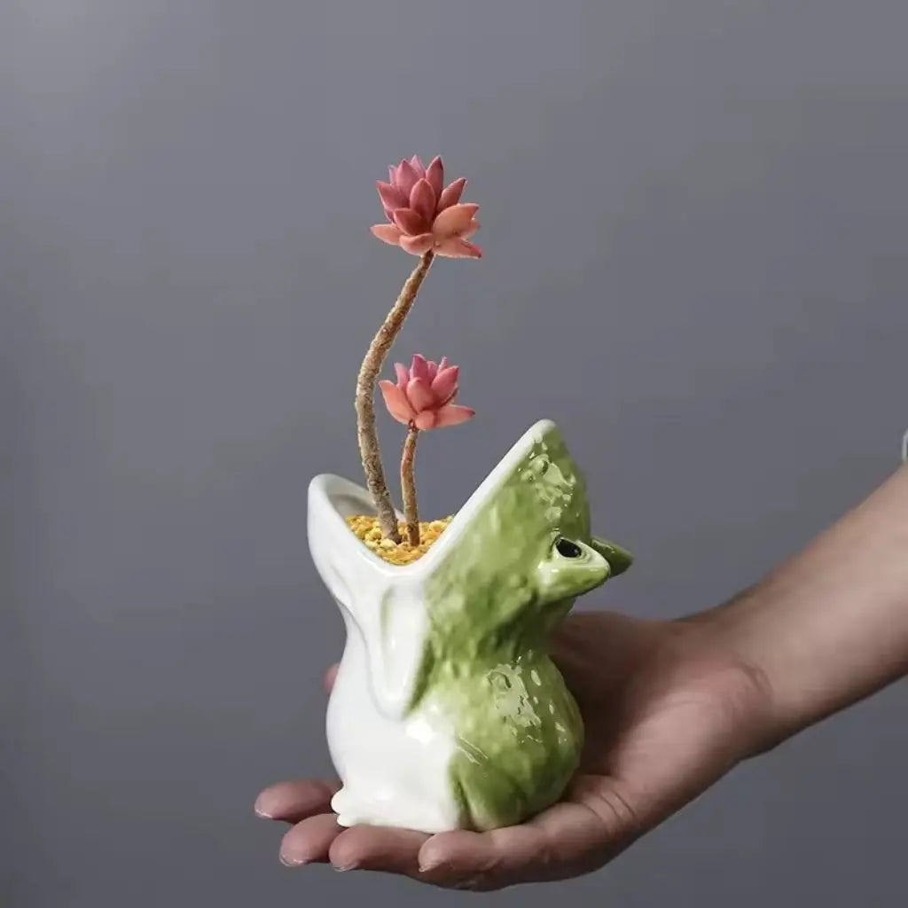 Small ceramic frog planter
