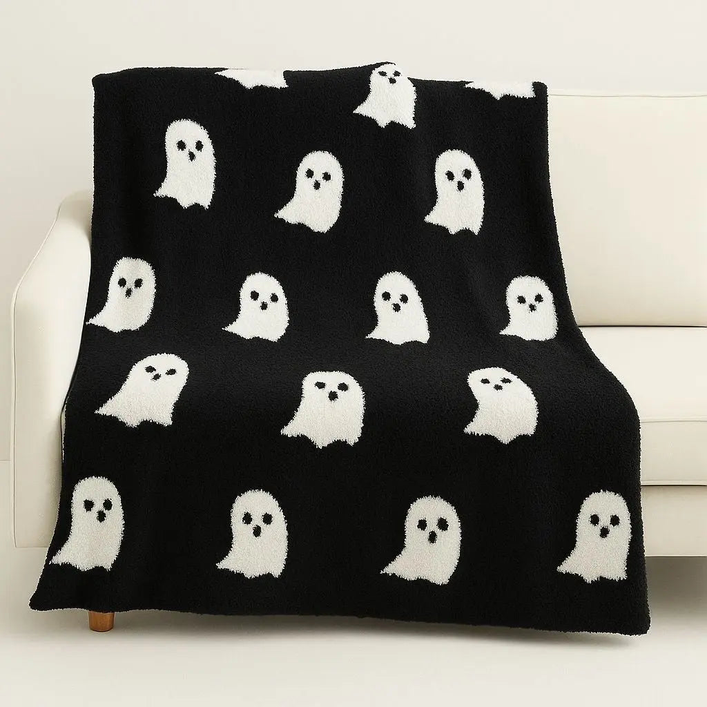 Knitted throw blanket featuring cute ghost patterns with half-velvet finish for ultimate home comfort