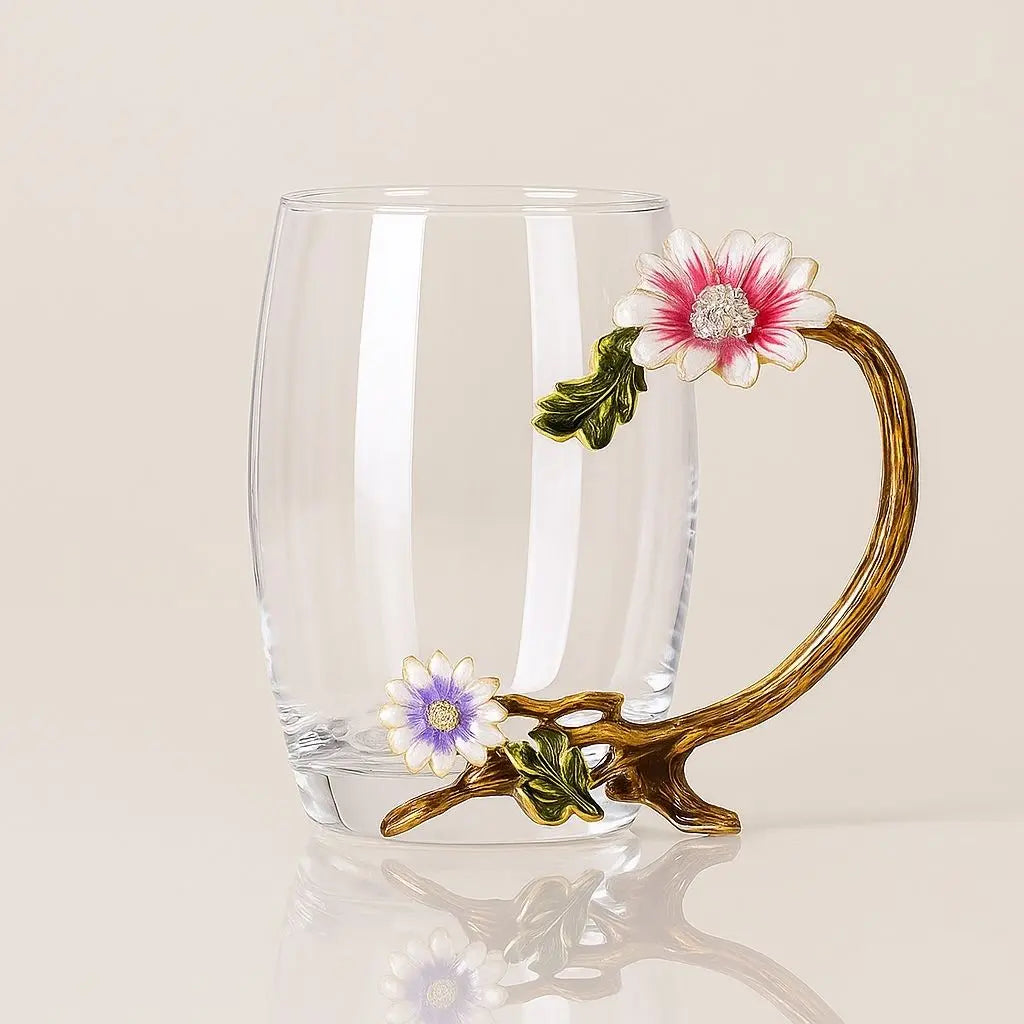 Clear glass tea cup with hand-painted botanical design and metallic gold accent handle