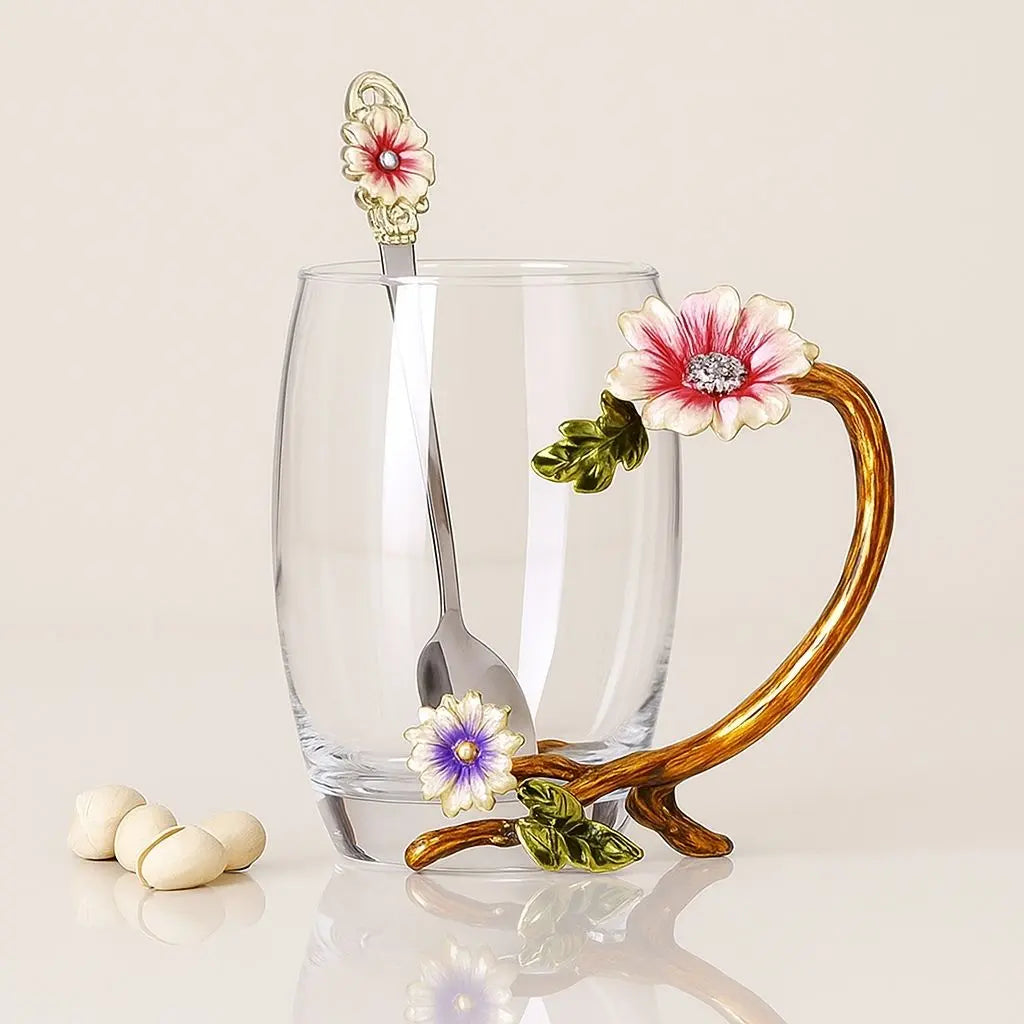 Decorative crystal teacup with colorful enamel floral motifs and gold-finished handle