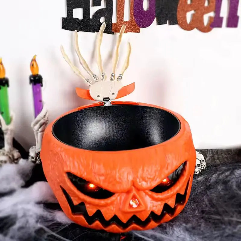 Halloween-themed pumpkin bowl with skeleton hand and candles in the background