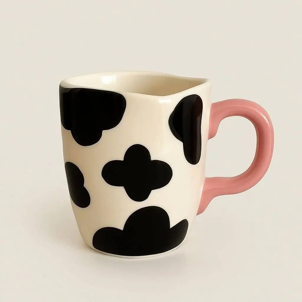 Handcrafted ceramic tea mug with cow print design, farmhouse style coffee accessories for home