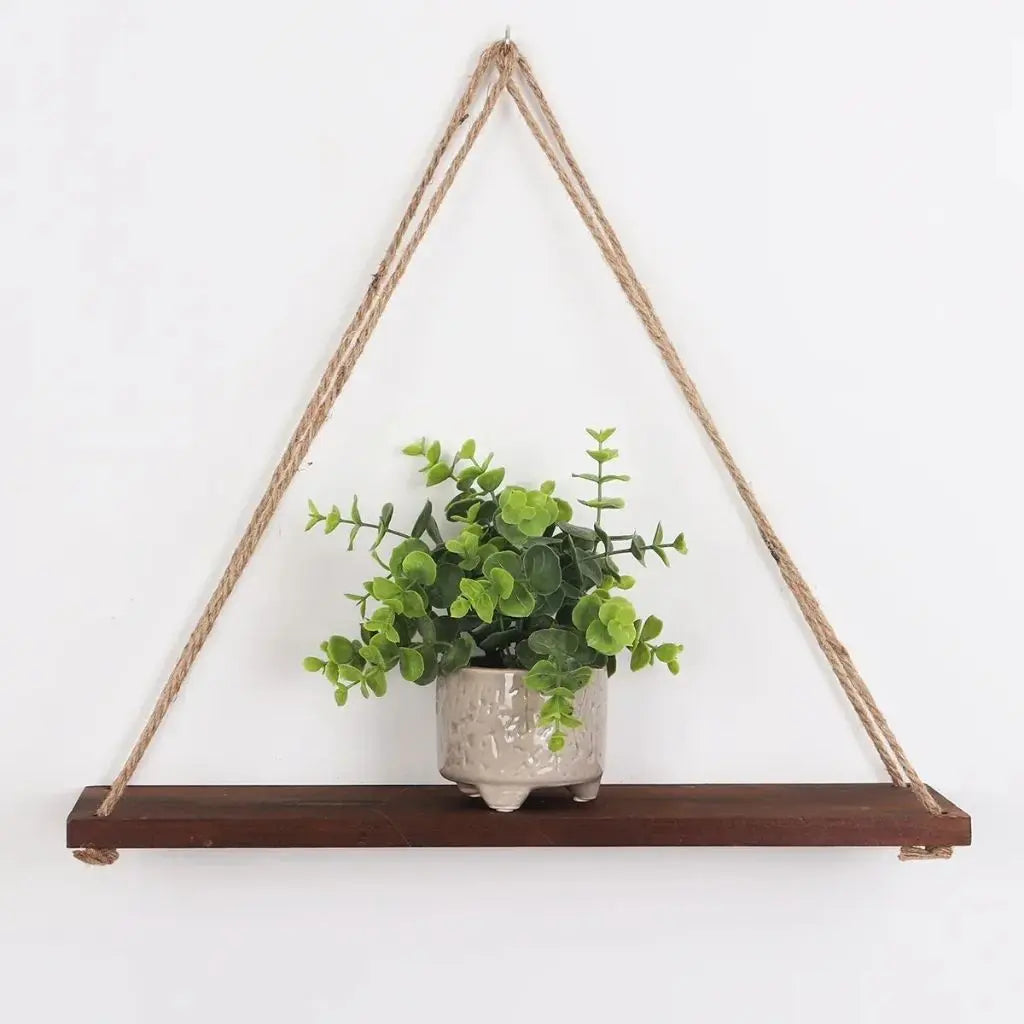 Hanging rope shelf made from natural wood perfect for minimalist wall organization and display