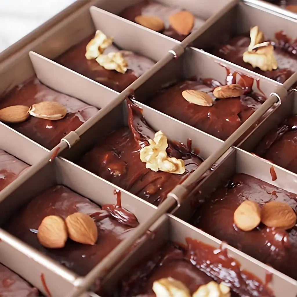 Nonstick brownie pan featuring removable divider system for uniform brownie squares and easy release