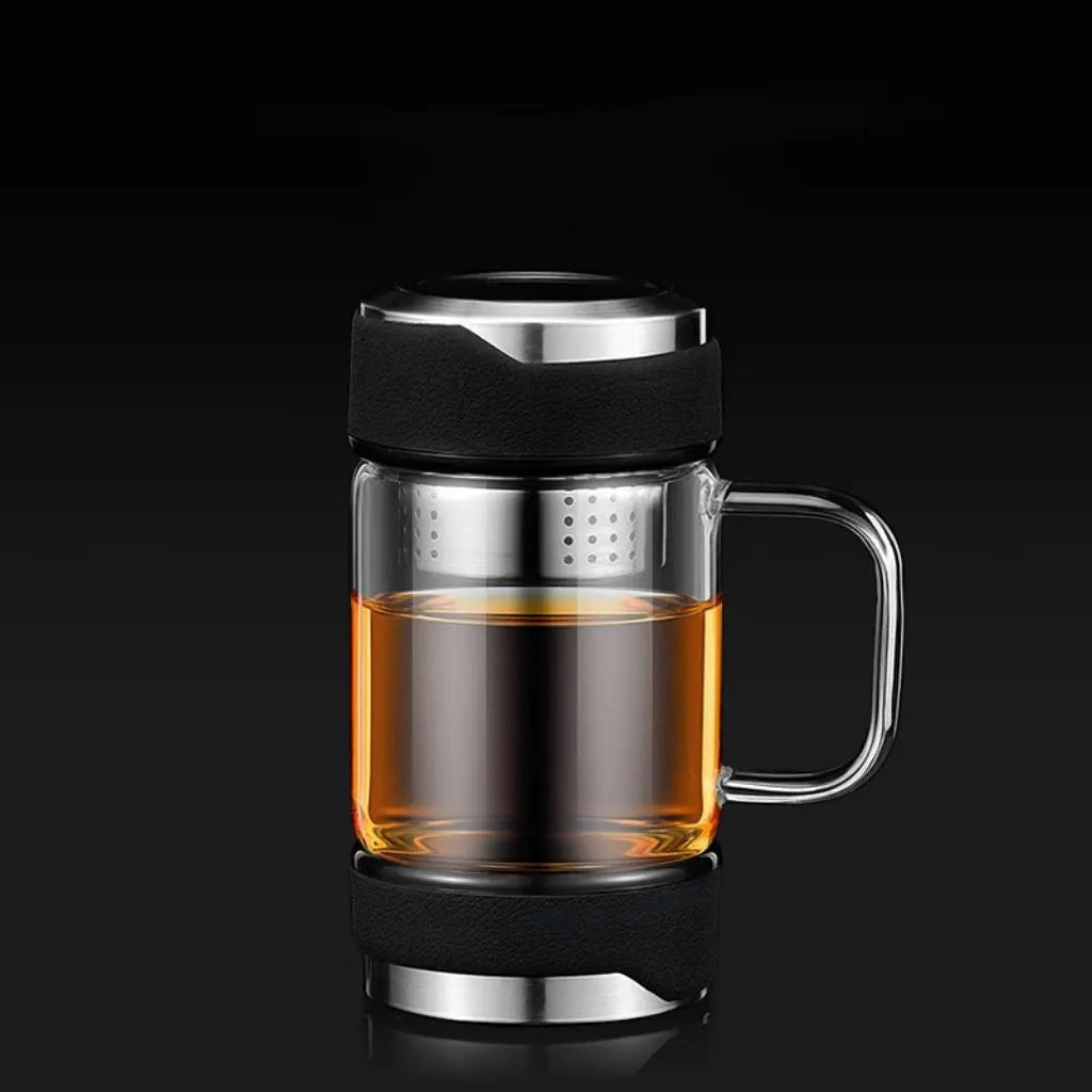 Insulated glass tea mug with ergonomic handle and non-slip base for safe office and home use