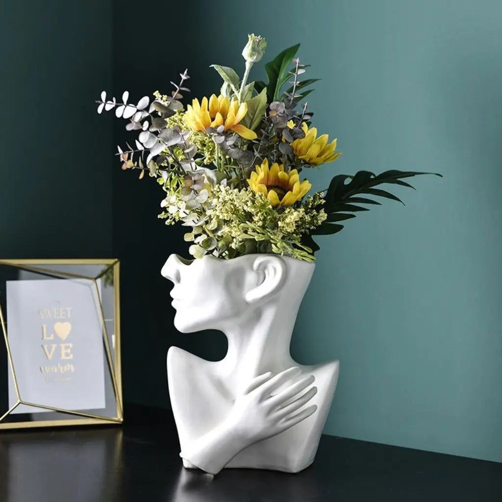 Contemporary ceramic vase centerpiece with abstract portrait design, modern interior accent for Nordic-inspired spaces