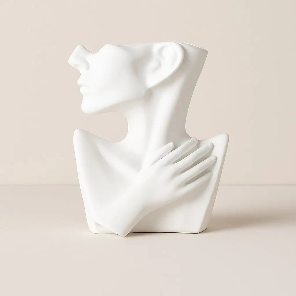 Sculptural ceramic vessel with modern portrait silhouette, artistic home decor piece for contemporary interiors