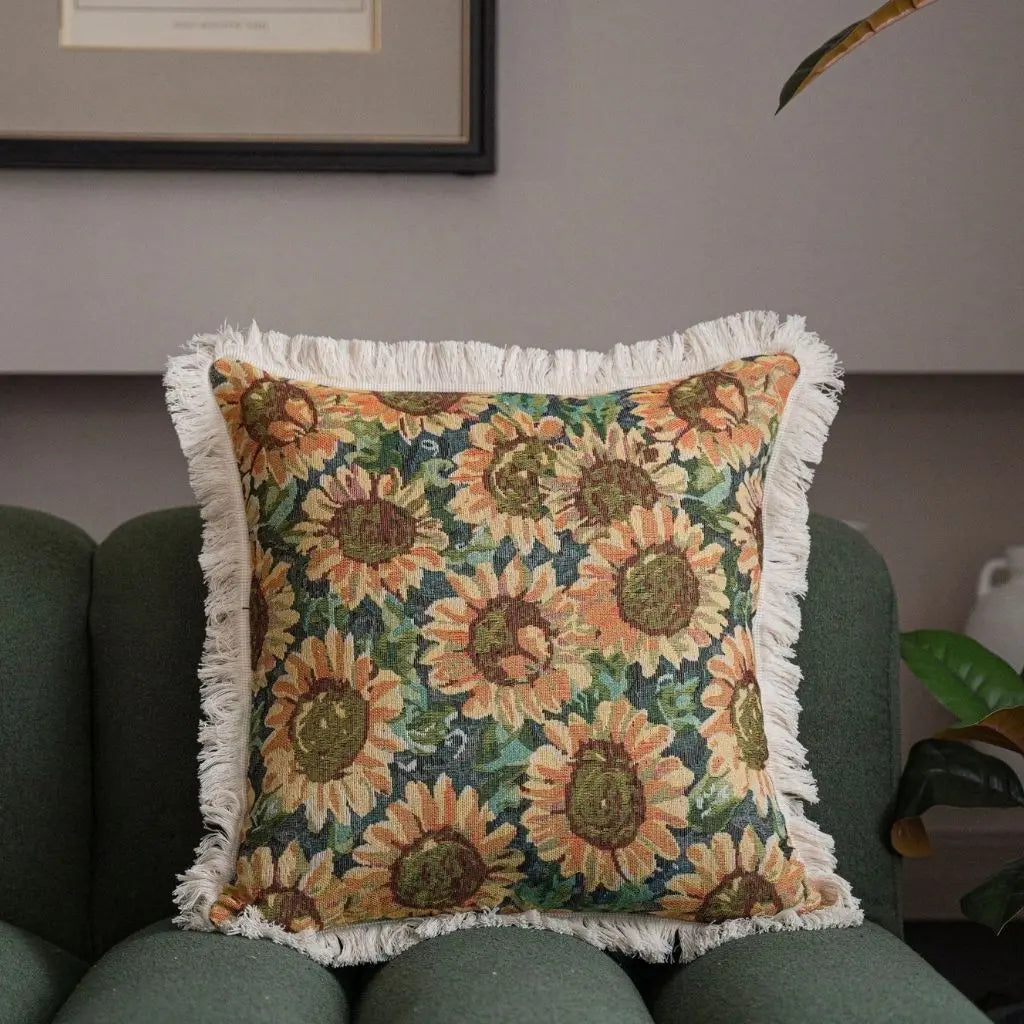 Jacquard pillow cover with black white geometric motif and tassel edges creating visual contrast