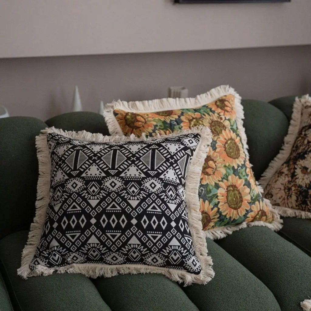 Geometric jacquard weave pillowcase with tassel accents adding textured depth to home decor
