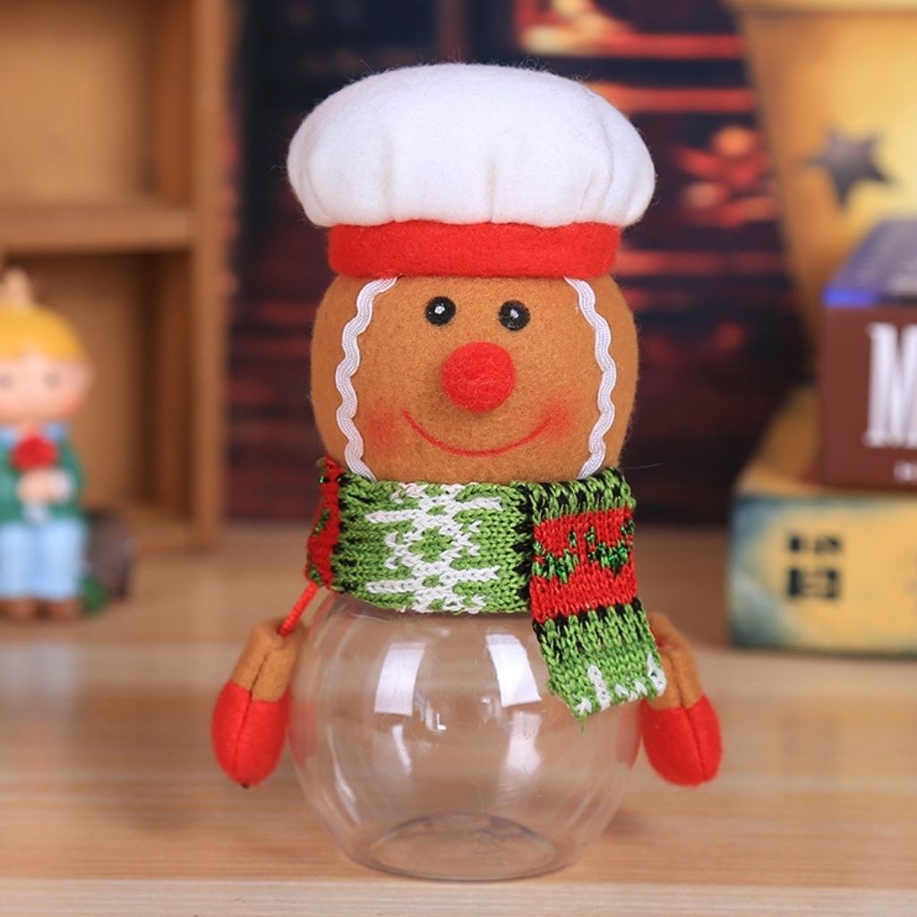 Clear glass candy jar with holiday character decoration perfect for table display