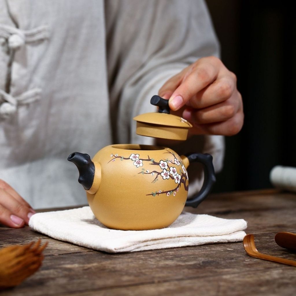 Interior view of purple sand clay teapot showing natural unglazed surface