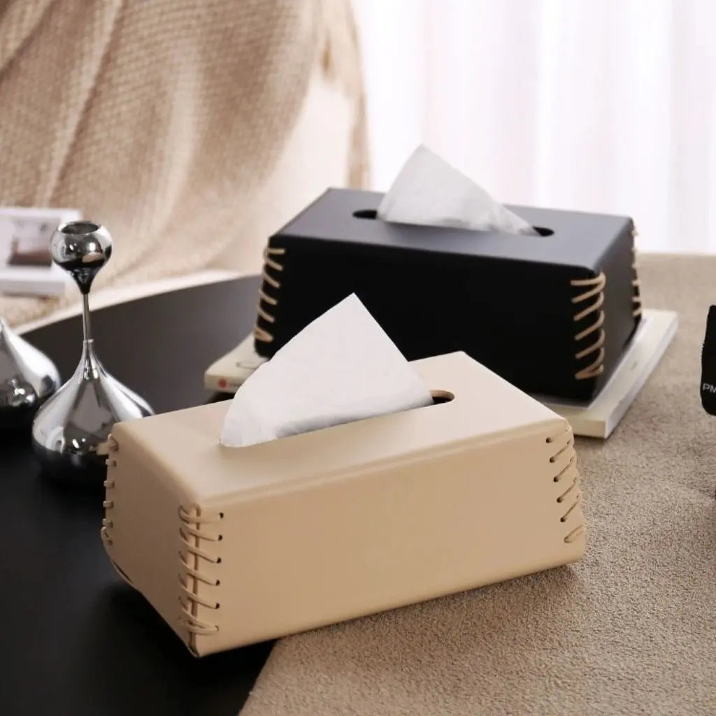 Handcrafted leather tissue box featuring minimalist design perfect for bedside and countertop use