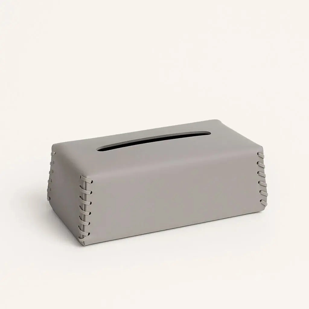Handcrafted leather tissue dispenser featuring minimalist design perfect for office and bedroom decor