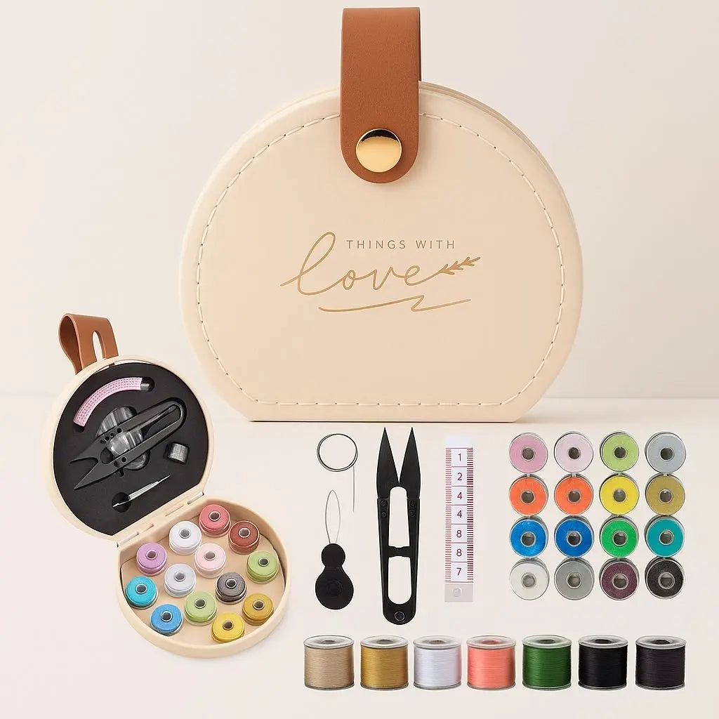 Portable sewing kit in round leather case with colorful threads and essential sewing tools for travel repairs