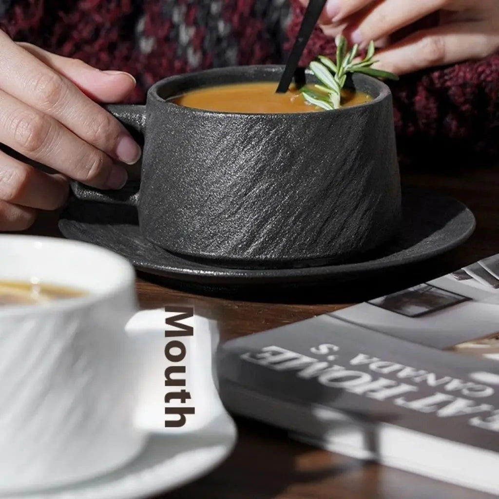 Artisan ceramic coffee cup with distinctive textured surface, handcrafted stoneware perfect for daily use