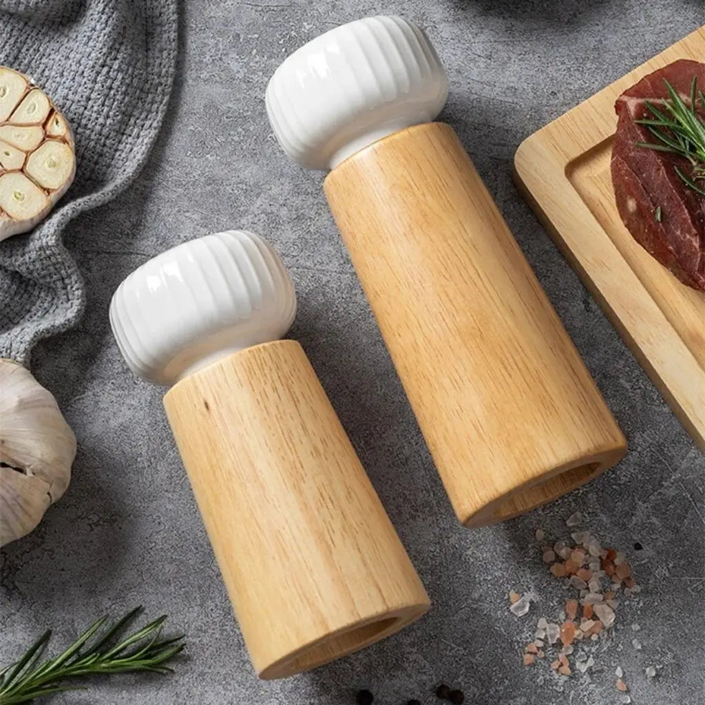 Ceramic pepper mill with wood body designed for manual operation and adjustable spice grinding