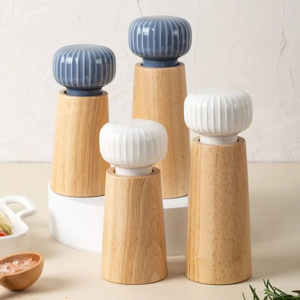 Wood ceramic grinder featuring manual pepper mill design for precise spice grinding and preparation