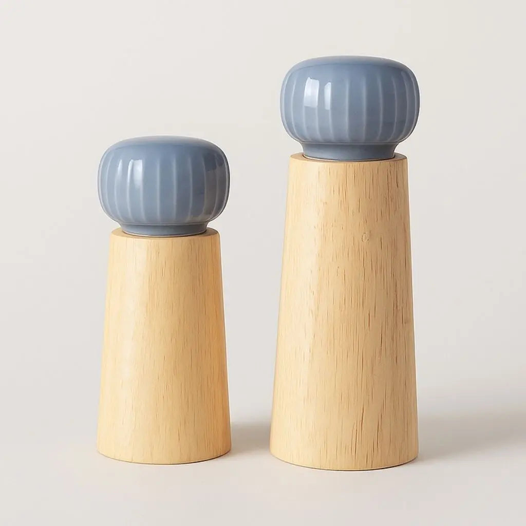 Ceramic pepper grinder with wood body featuring adjustable coarse to fine grind settings for fresh spices