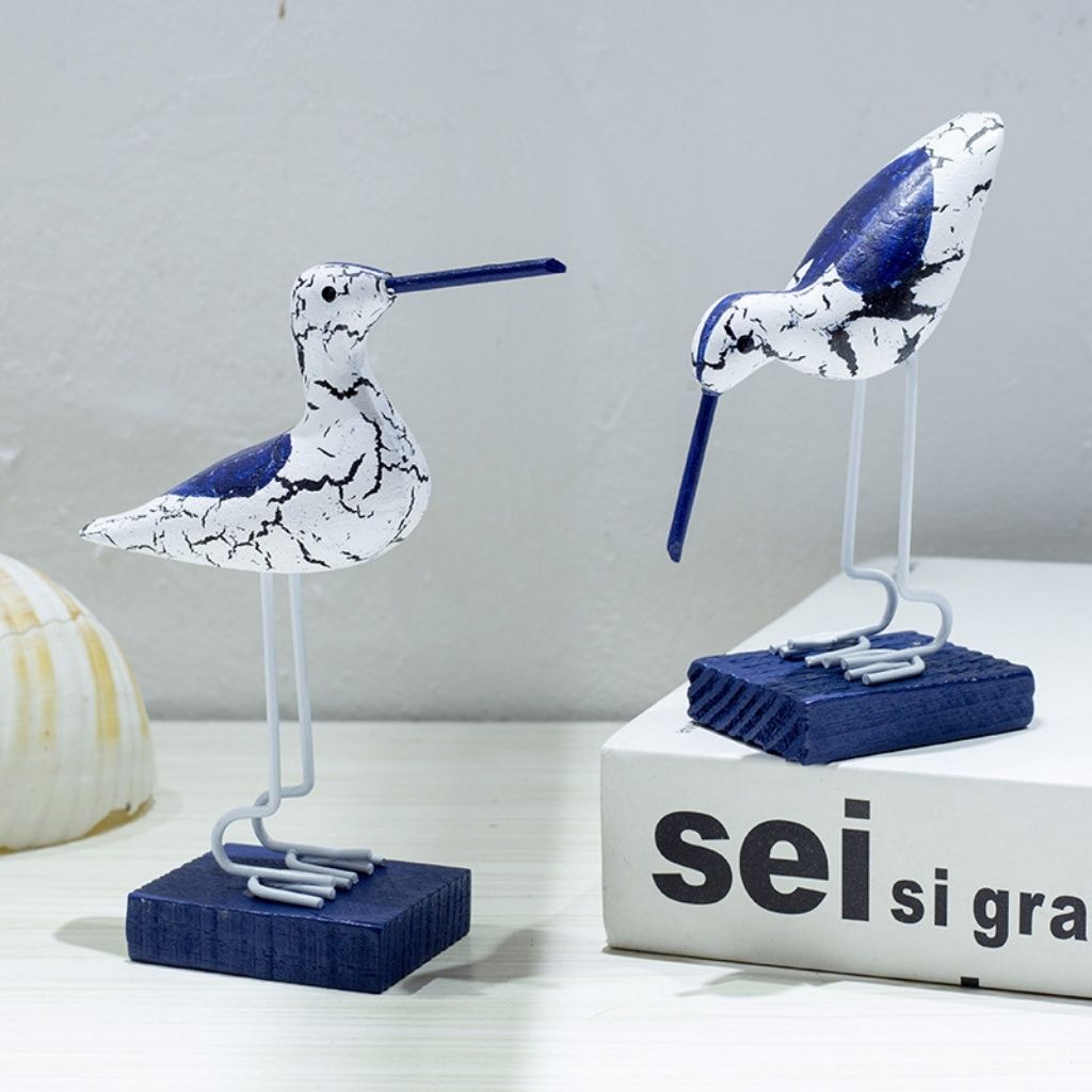 Carved seabird figurines coastal wood art nautical bird decor ocean seaside maritime