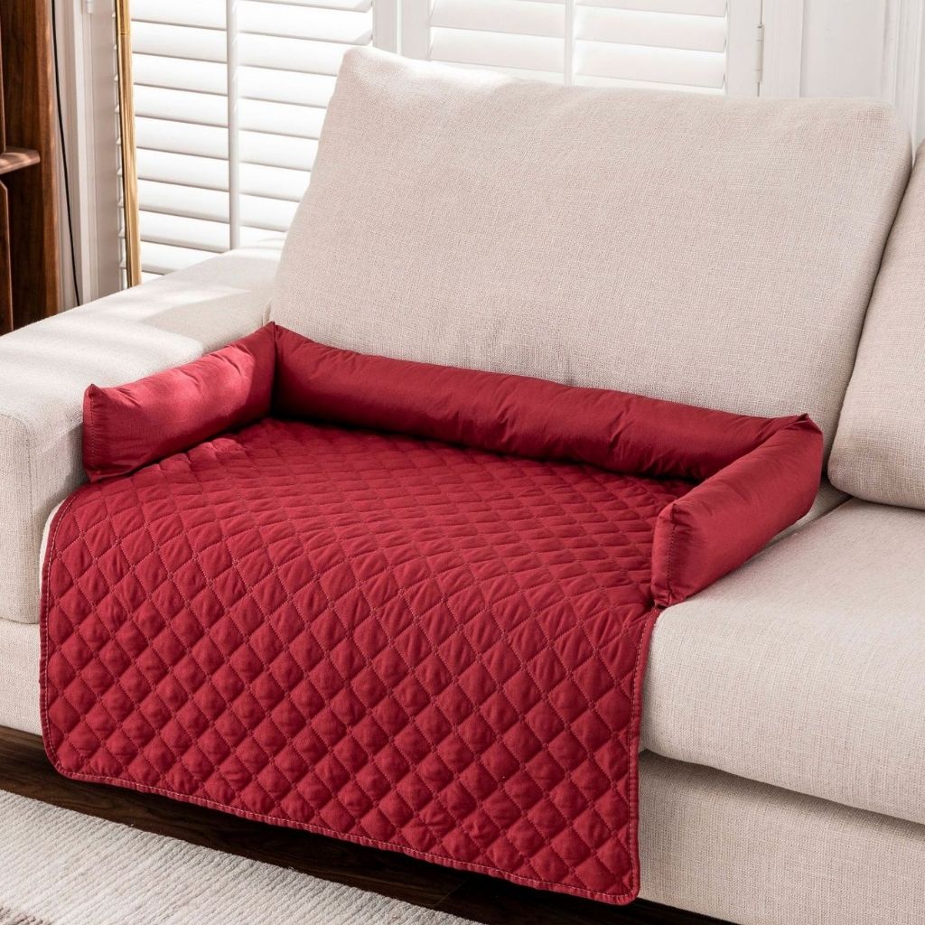 Quilted pet furniture cover with waterproof backing on couch