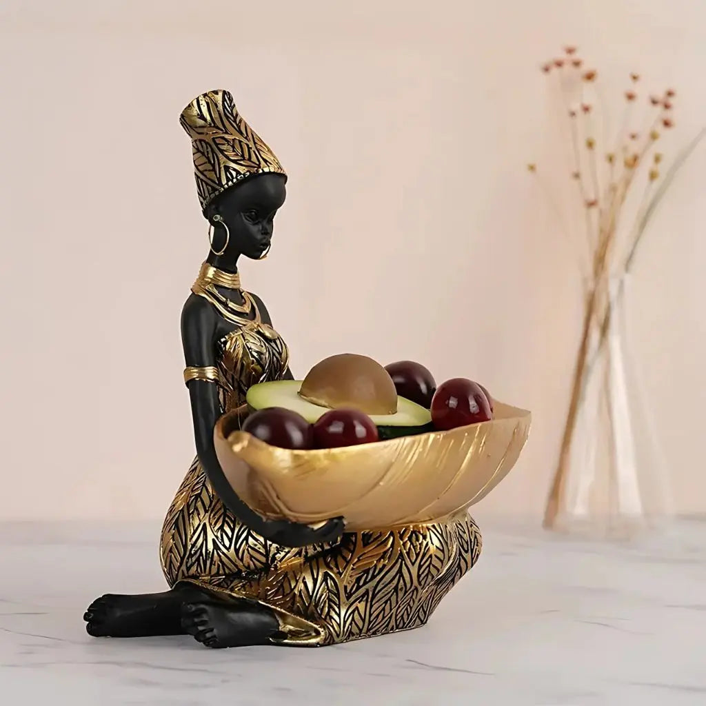 Close-up view of Mira Sculpture Storage Tray showing intricate gold accents and cultural details