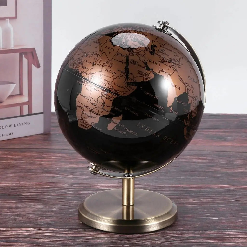 Rotating desktop globe with durable metal base, elegant home accessory for geography learning