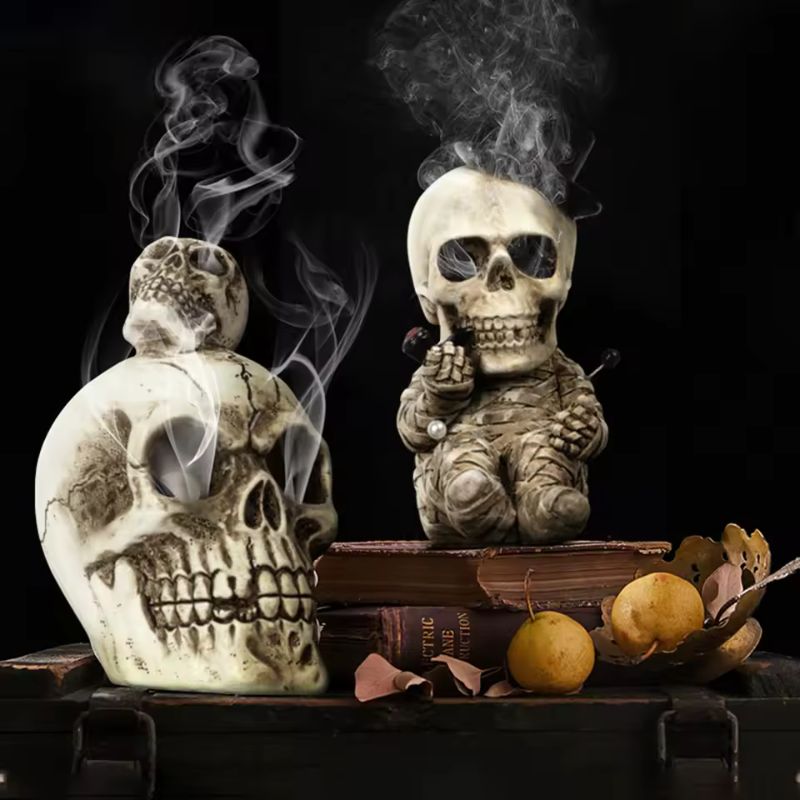 Handcrafted resin skull figurines with gothic detailing, perfect Halloween