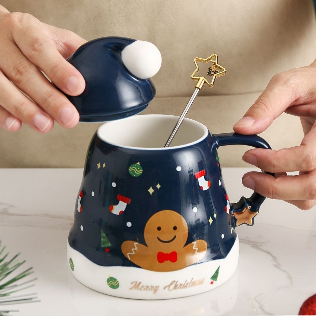 Rounded ceramic coffee mug with glossy finish and festive winter design