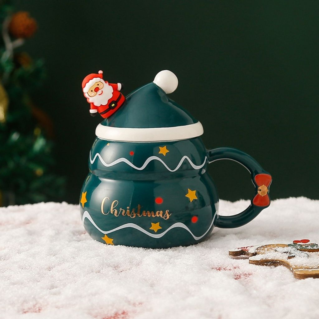 Ceramic cup with detachable lid and Santa detail, everyday fit for home use.