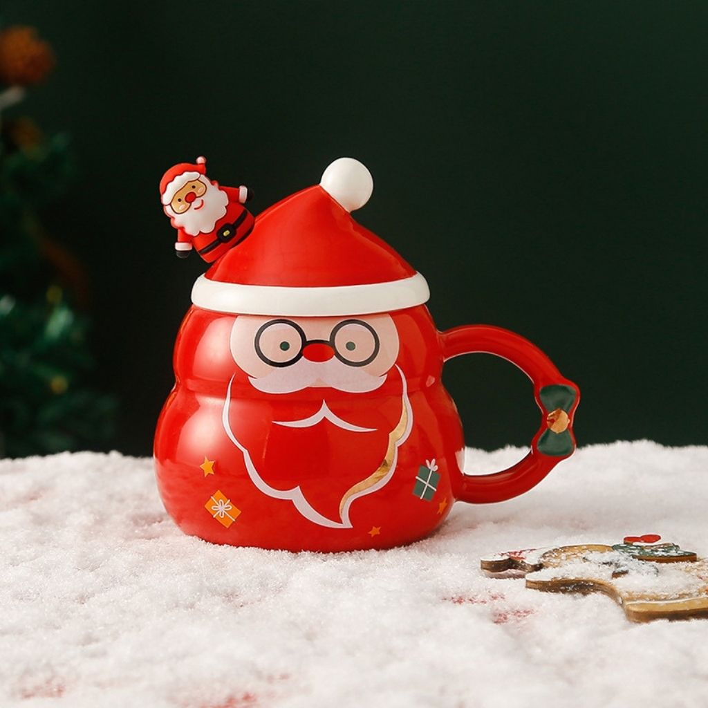 Ceramic mug with decorative Santa and holiday icons, relaxed fit for family setting.