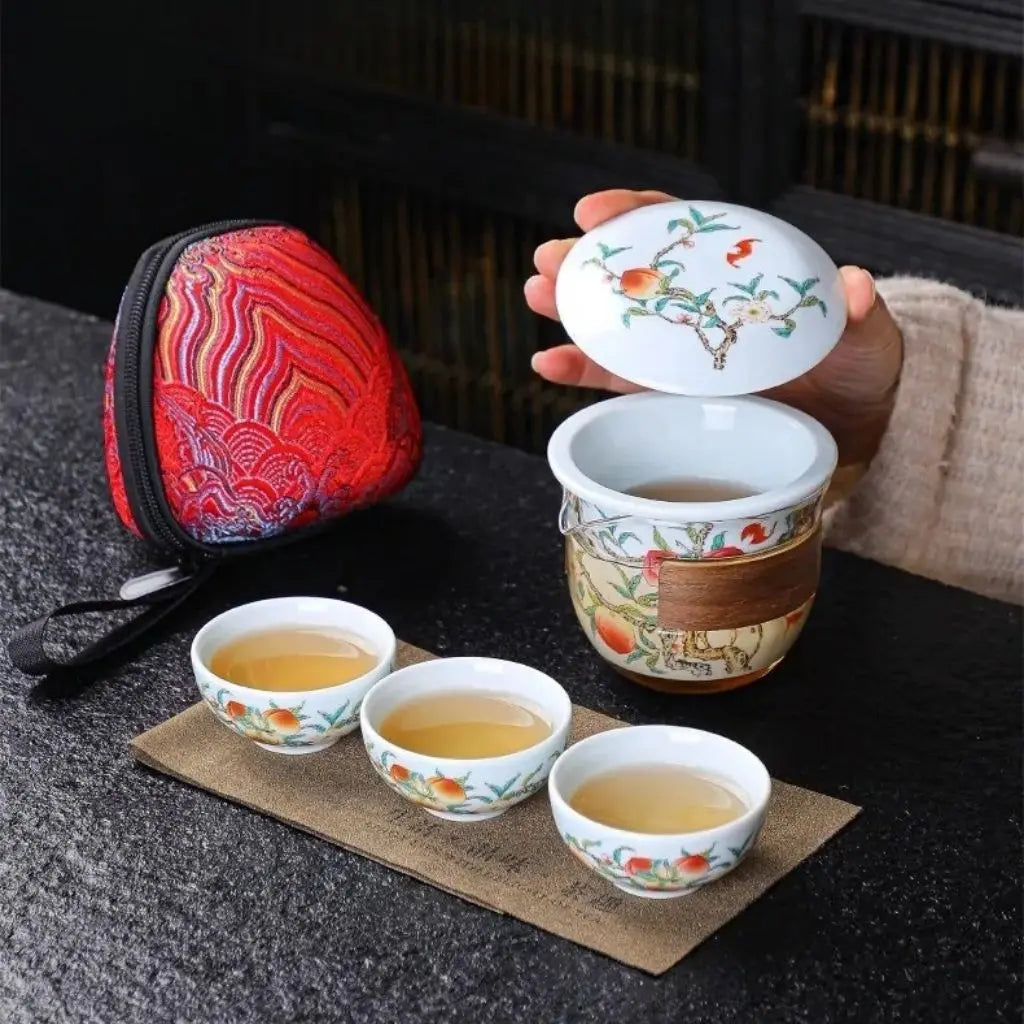 Compact jade porcelain teapot set with matching cups ideal for travel tea ceremony experiences