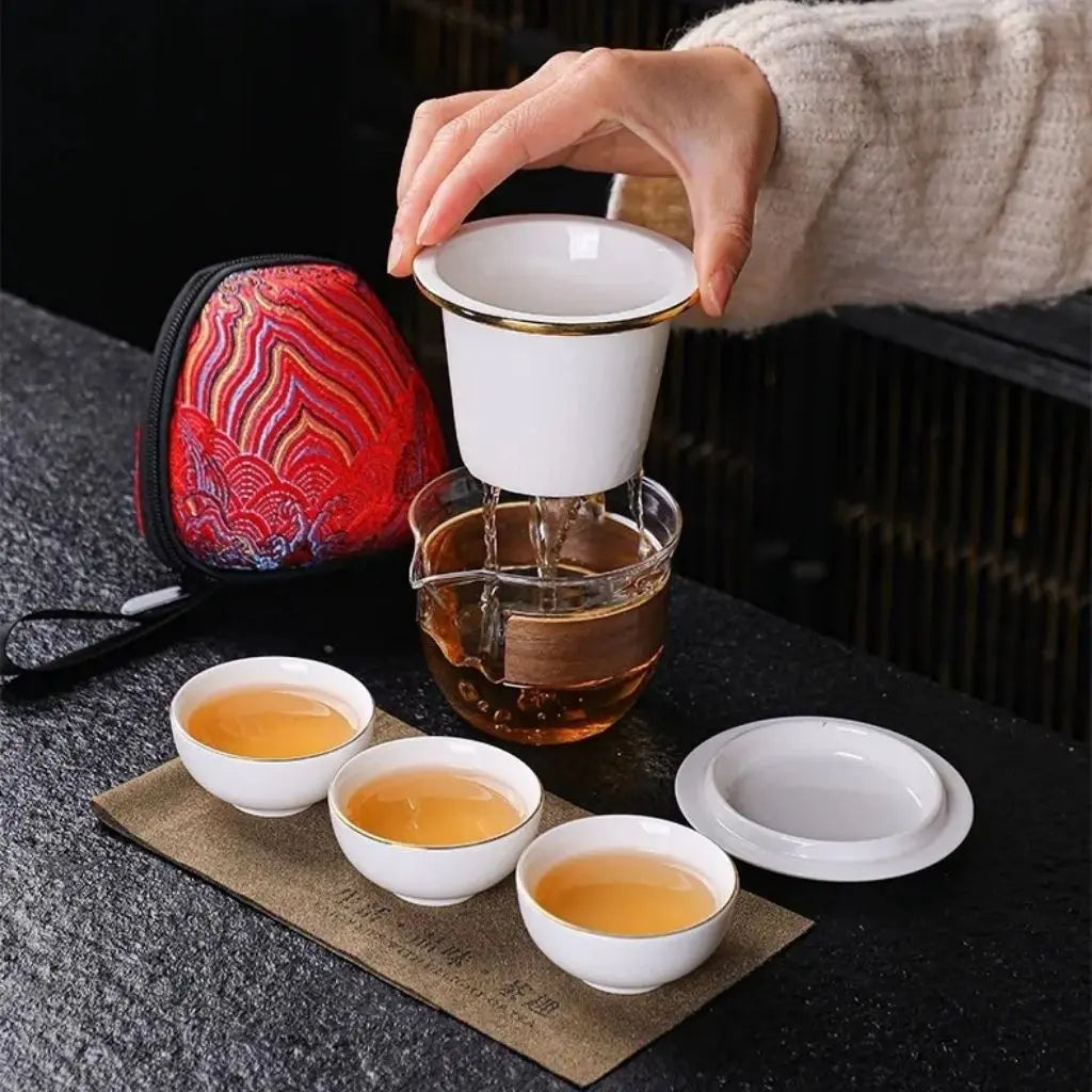 Compact travel tea ceremony kit jade porcelain teapot with matching cups for gongfu brewing