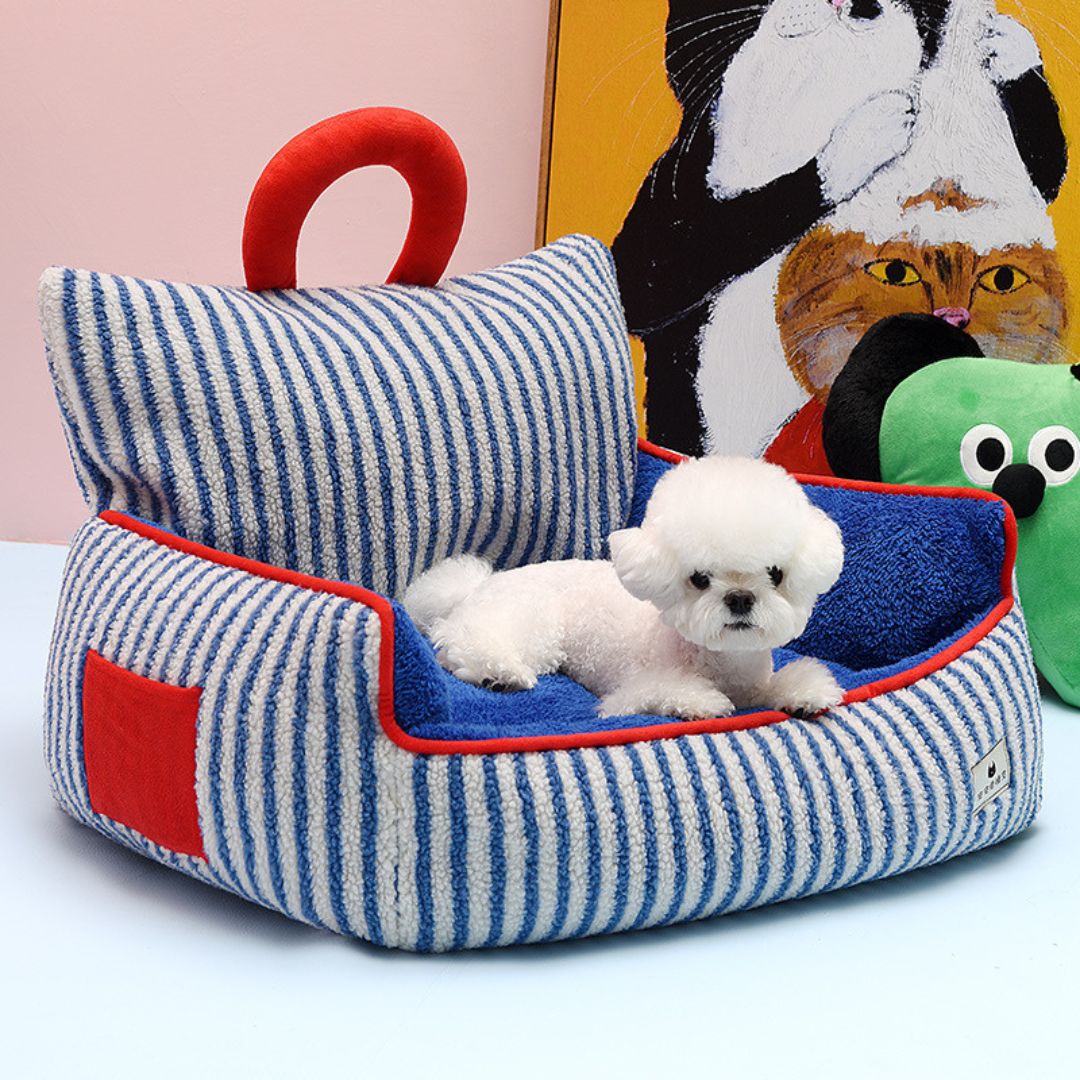 Orthopedic dog bed with bolster edges for anxiety relief and support