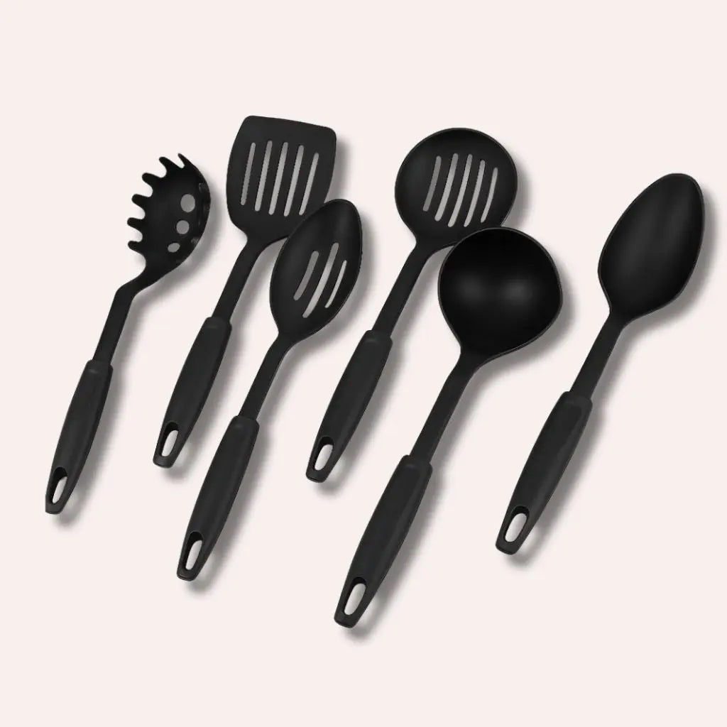 Versatile cooking tool set featuring slotted spoons and spatulas for safe non-stick pan meal preparation