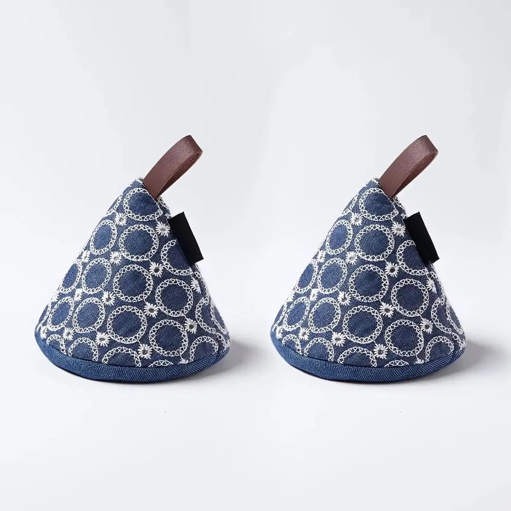 Heat resistant quilted mitts featuring Nordic cone design for safe cooking and baking tasks
