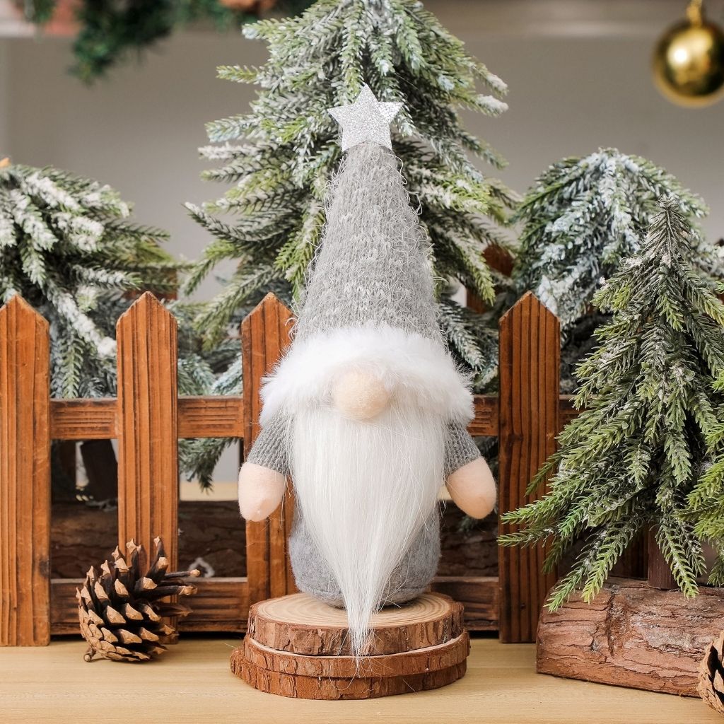 Christmas gnome decoration showing plush texture and weighted base for stable display