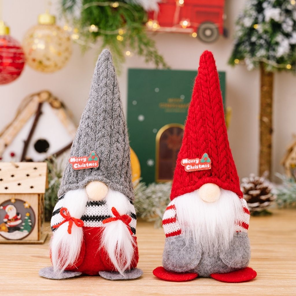Scandinavian style gnome with tall pointed knitted hat and plush beard for holiday accent