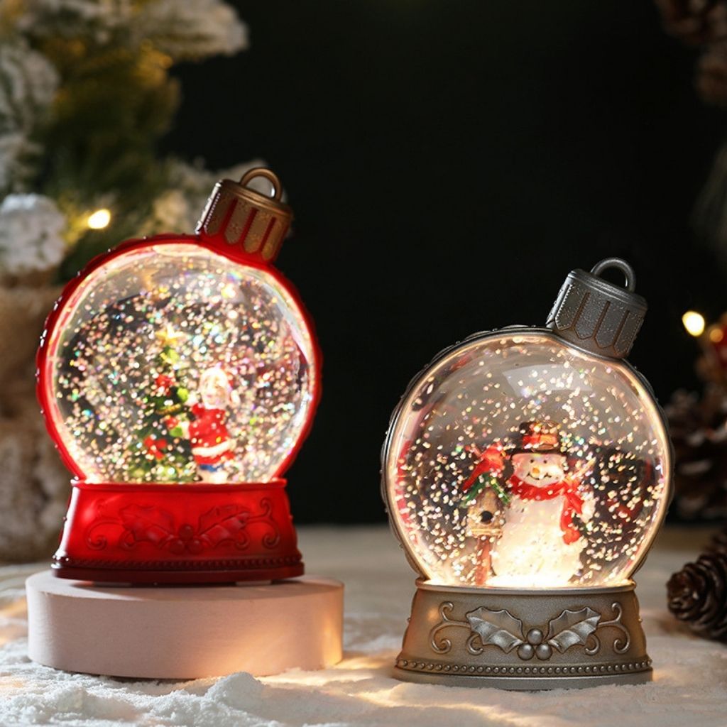 Cordless battery powered snow globe with glitter and festive winter scene