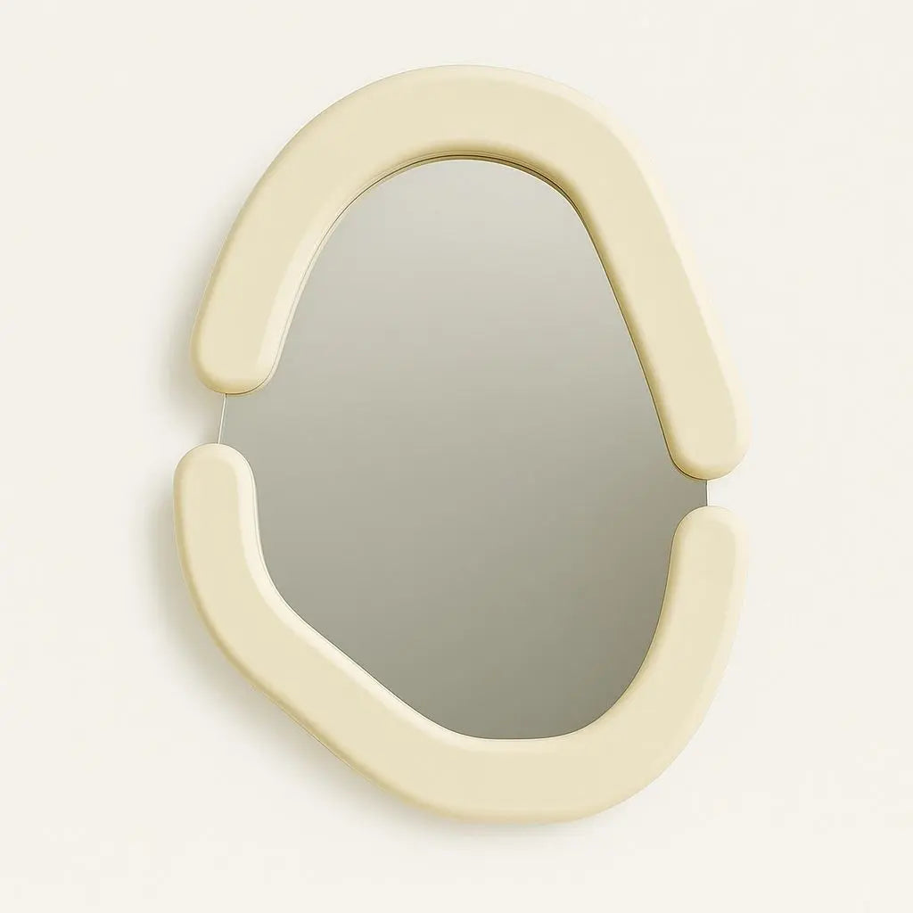 Modern wall mirror with a cream-colored, curved frame on a light gray background