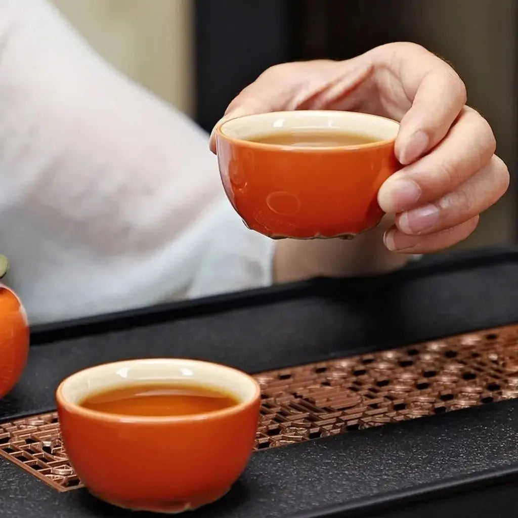 Vibrant orange ceramic tea set persimmon design porcelain teapot with matching cups handcrafted gift