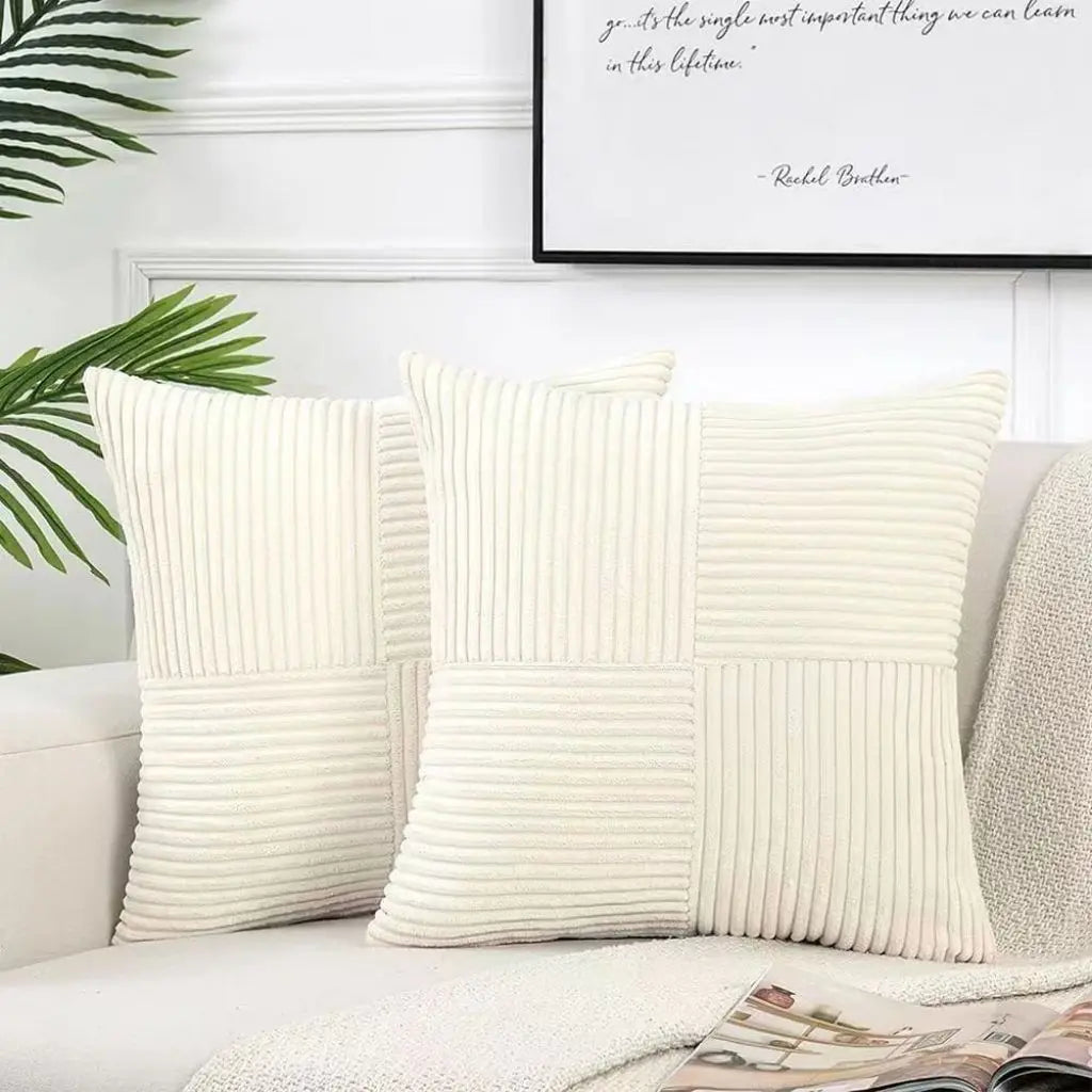 Corduroy throw pillow with ribbed patchwork texture adding sophisticated accent to sofa and bed styling