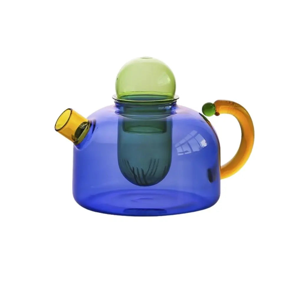 Complete glass teapot collection with matching accessories, featuring colorful artistic design elements