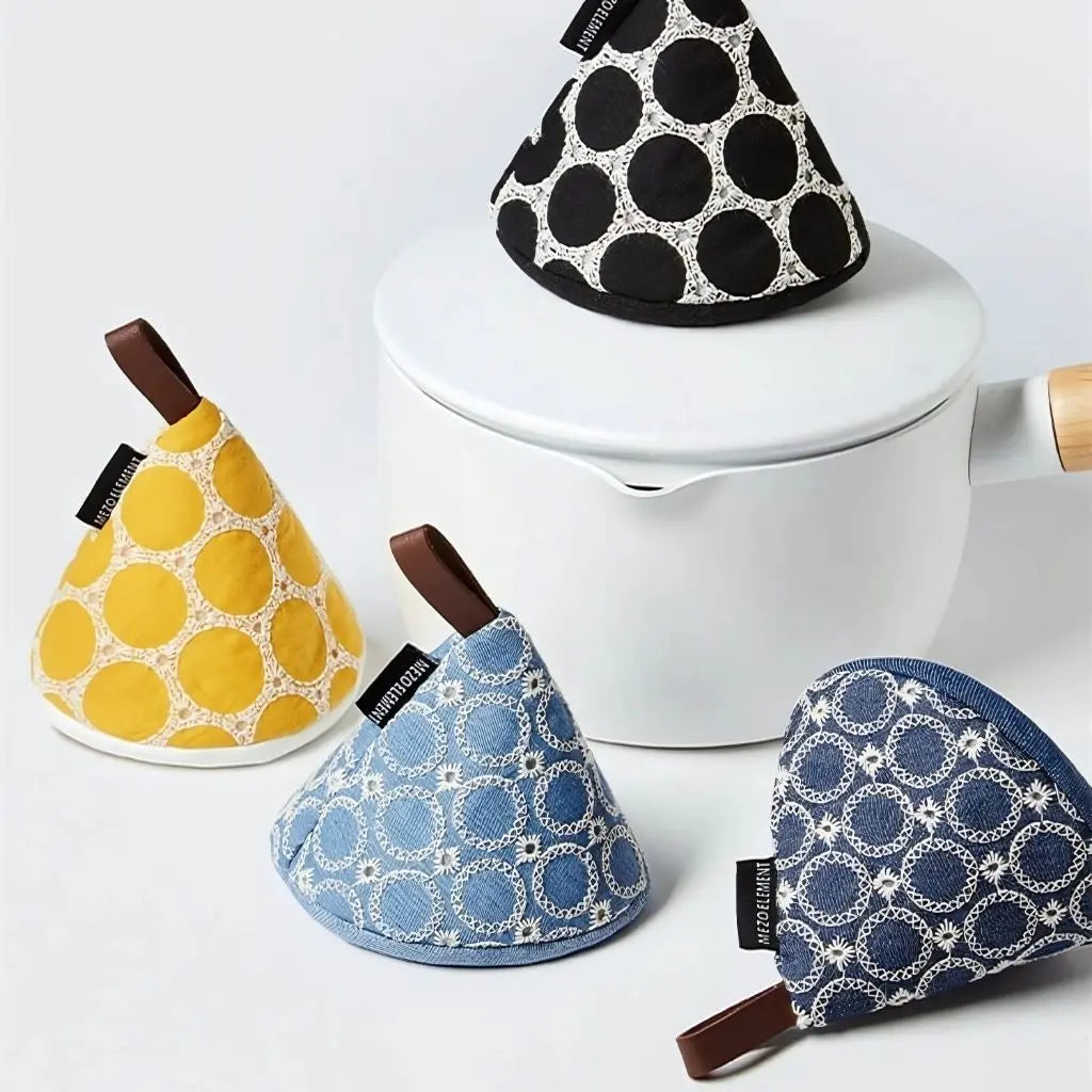 Quilted Nordic cooking mitts with cone design, providing heat resistant protection for kitchen tasks