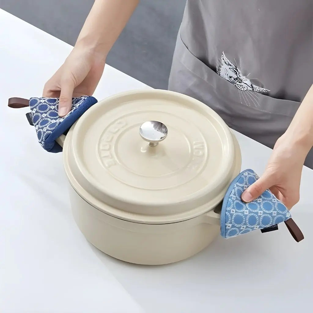 Quilted Nordic cooking mitts with cone design, providing heat resistant protection for kitchen tasks